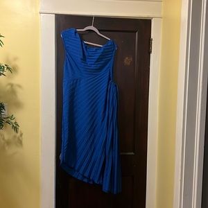 Asymmetric dress with side cut out .